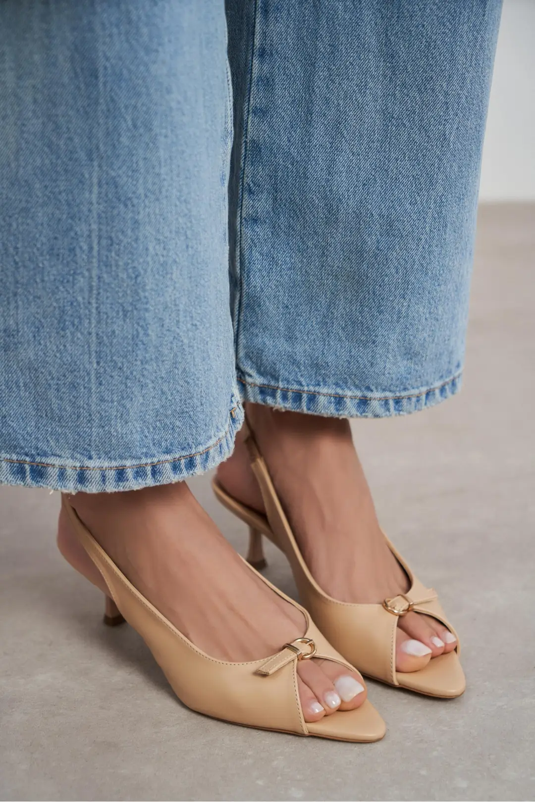 Rone Matte Pointed Toe Front Buckle Slim Heel Slingback — Nude